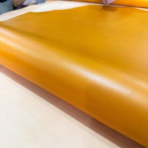 Roll of smooth orange leather