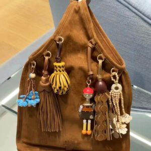 Brown bag with colorful charms attached